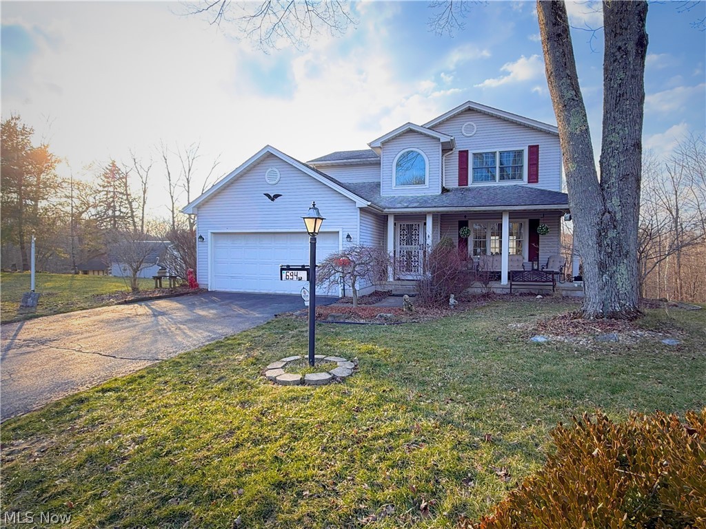 This stunning three-bedroom, three-bathroom house in Meanderwood offers a peaceful retreat tucked away in a cul-de-sac, backing up to Meander Reservoir. It features an inviting entryway, a spacious open-concept kitchen, and a large living area perfect for entertaining. Sitting on nearly half an acre in Austintown, the primary suite includes an en suite bathroom and a generous walk-in closet, blending comfort with style in a beautiful natural setting.