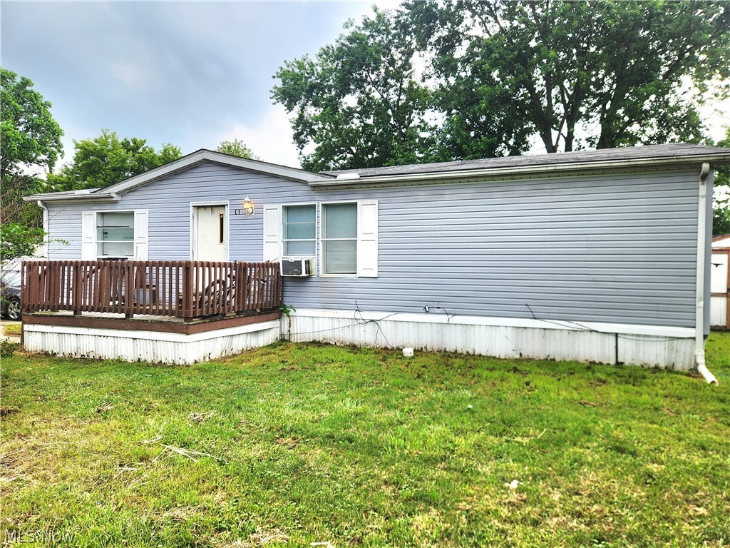 This mobile home is set on a corner lot in a quite community, this spacious double wide is perfect for those looking to downsize or a first time buyer! Open floor space with a large kitchen with dine in capabilities, as well as main bedroom with bathroom attached and a large closet! In addition to two more bedrooms and another full bath is mobile home can accommodate! It offers the opportunity to enjoy affordable, spacious living in a quiet setting! Lot rent is $539.34 and includes trash pick up.