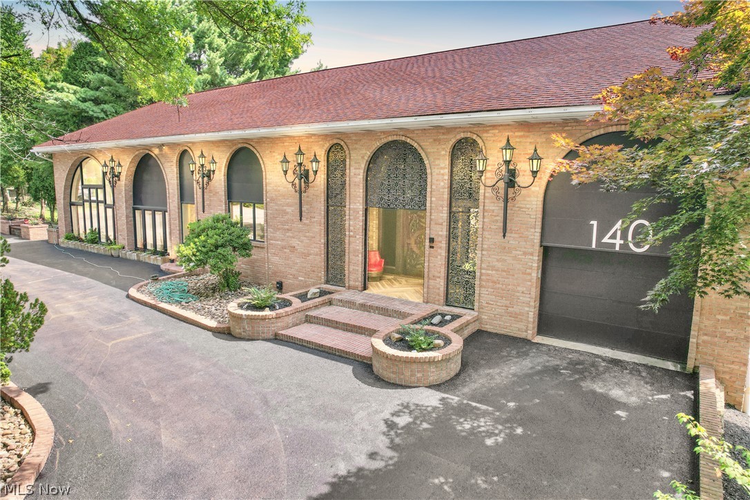 Do not miss this amazing home tucked on a quite street nestled on almost 2 acres in the heart of Steubenville. This amazing 4 story home has such unique features, it is a must see! It’s been completely redone! This 6 bedroom home has many possibilities for extra living space and extra bedroom possibilities. The numerous bonus rooms offer a unique space for entertaining throughout. The Massive living room flows effortlessly to the completely renovated kitchen on the main floor. Solid wood beams highlight and Accentuate throughout.The built-ins and cabinetry are a must see! 4 garages and a unique built in wine cellar. Additional rooms feature wet bars, library and office displaying the custom wood work throughout and a 10 person Jacuzzi. This multilevel home features decks that overlook scenic views. This amazing home also features mini golf course which was redone this year and a go cart track and bocce court. Recently repaved driveway! All Heating and cooking units have been upgraded to high efficient Heat pumps with warranty that will transfer. Rear Outdoor kitchen on the massive deck- perfect for entertaining. Call an agent today!
