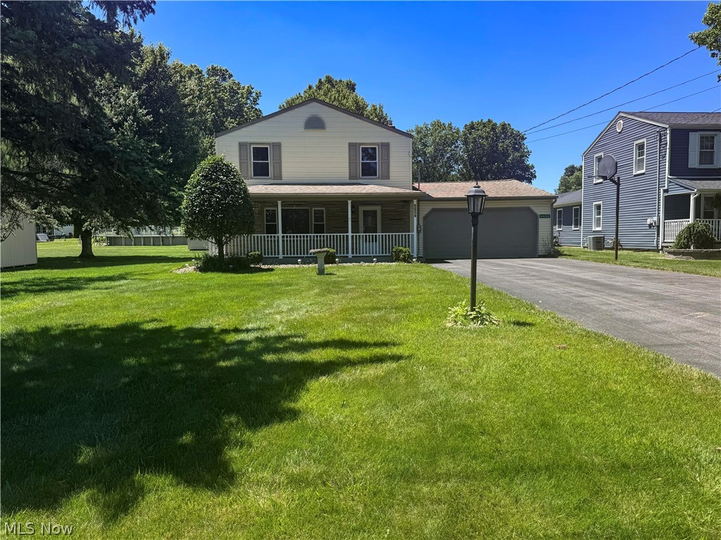 This 3-bedroom, 3-bathroom home on Clingan Rd. in the Poland School District has been tastefully updated and ready for you to move in to immediately! This house is less than a minute away from amazing restaurants, grocery stores, gas, fast food, doctors and vets...you will absolutely LOVE the location! You'll notice how well cared for this home has been throughout its past ownership and has been recently renovated to fit today's modern touch! Seeing a newer roof, asphalt driveway, siding and windows when pulling up, you'll understand exactly what I mean! Sit on the large covered front porch and enjoy your morning coffee or step through the front door to the living room with large picture window, brand new electric fireplace, and new vinyl flooring that runs throughout the whole main floor. Beautiful black cabinets with gold accents, new countertops, backsplash and black-stainless appliances are featured in the newly expanded kitchen. A dining room with new chandelier leads into the family room with a half bathroom and exit to the back patio area. This room could also be converted to a 4th bedroom by adding a door which would make for a large bedroom with half bath attached if more space is needed! Upstairs are 3 bedrooms all with brand new carpet, ceiling fans, new 6-panel doors throughout the whole house, paint, hardware and fixtures. A full bathroom with tub-surround also resides on this level! The basement has just been partially finished (previously waterproofed) with new LVT flooring, blacked out ceiling, recessed lighting and a full bathroom with tiled stand-up shower and new vanity. The laundry room has a utility tub, washer, dryer, and newer furnace. Outside is a covered back porch with brick patio perfect for hosting a fire on those summer nights! This one is an absolute must see!