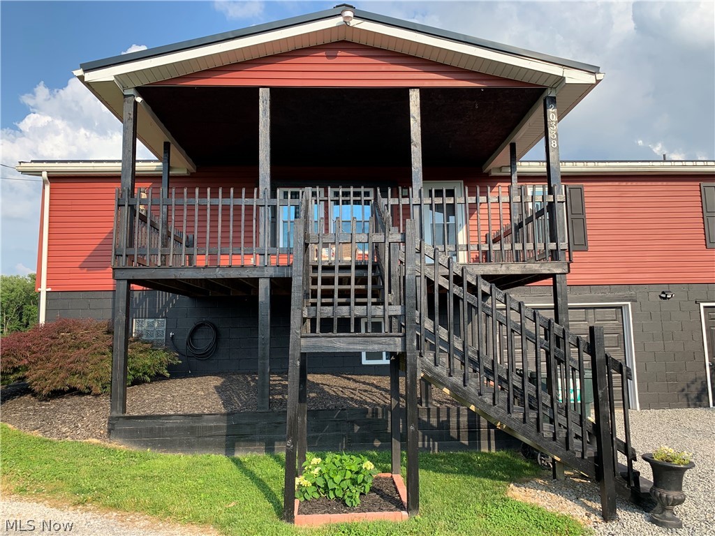 Cozy Country Setting with this beautiful ranch style home on full basement.  You will find comfort on the back 16 x 55 covered concrete patio and a great place to entertain guests. The open concept kitchen / dining with natural wood cabinets, leads out to freshly painted 2021 front deck.  Three bedrooms with a possible fourth bedroom or multi-purpose room off of the family room. The master bedroom with full bath.   Laundry room with extra storage, matching washer & dryer.  
All new black stainless appliances. All new carpeting and lighting.  The windows were replaced 2020. Well pump 2021 (5 year warranty).  Pellet stove 2019.  Reverse osmosis unit to the fridge.  Large pole barn building for storage.