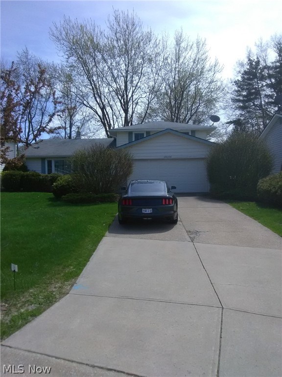 Out standing split level with updates Galore New windows through out newer carpeting and hot water tank. All appliances and window treatment beautiful hardwood floors, vaulted beamed ceiling. partially finished basement with recessed lighting,loads of storage above garage and bedrooms storage shed enclosed porch home warranty and more.