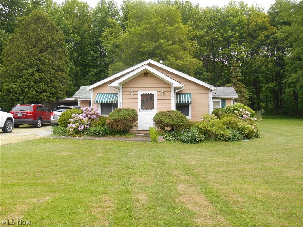 Low utility bills.  Three bedroom, one floor  home located on 3 lots.   Attached carport. Large outbuilding in back yard.   Same owner for 68 years.
Executor/estate will do no repairs, selling as is condition.  All inspections for buyers knowledge only.  Utility room, additional storage room, and a carpeted bonus/family room.  Stove and refrigerator are included with purchase of home. Septic inspection done.