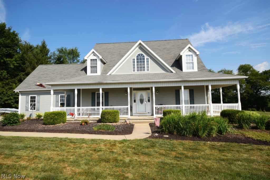 Beautiful country home with great curb appeal and first floor living! Step into open 2 story foyer hardwood floors ~ 4BR, 3.5BA, 4 car garage & 2 full kitchens. Tons of natural light. Great room with dramatic 2 story vaulted ceiling with wood-burning fireplace & open catwalk above. Custom Amish oak cabinetry and new stainless steel Samsung appliances in Aug. 2014 makes the dream kitchen. 1st floor spacious master suite has deck access with french doors, large walk in closet, spacious bath featuring jet tub, double sinks & separate shower. First floor laundry available. Basement has beautiful finish with full BA & kitchen. Tons of storage! 4 car garage-2 attached & 2 detached plus large storage shed. Large trex deck w/much landscaping. Surround sound, heat pump for energy savings. New water heater in 2013. 2008-New Reverse Osmosis Softener & Iron filter added to softener in 2013. Sq footage does not reflect 805SF additional finished living space in the lower level. Upstairs bedroom has