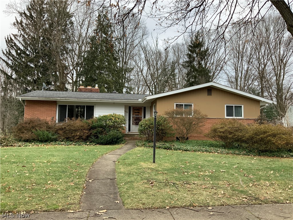 Spacious brick ranch in Fairlawn's Revere Village. This home was built and lovingly cared for by the current owner. The living room has hardwood floors, a brick fireplace and beautiful picture window. The spacious dining room also has wood floors, built-in China cabinets and a sliding glass door to patio. There are 2 full baths on the main level as well as 3 nice sized bedrooms with hardwoood floors. Back bedroom has a washer & dryer in closet that can also stay. 2nd washer & dryer are in the basement, has laundry shoots from bedroom. The kitchen has an eating area , granite countertops and the original oven. Enjoy quiet time in the family room with built in desk & bookcases. A full basement is partially finished with a 2nd fireplace, workshop area and plenty of storage. The possibilities are endless! A home warranty I provided by the sellers. The home is just steps away from Fairlawn Country Club Gold Course.