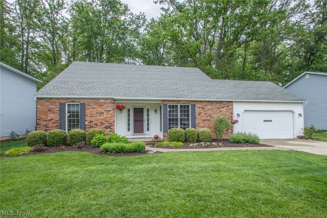This home is a must see for anyone wanting to live in Olmsted Township. Freshly Painted on the inside. New Carpet in most of the rooms. This 4 bed 2 full bath Cape Cod style home offers plenty of space to entertain. Vaulted ceilings in the family room give a warm welcoming feel upon entry as does the space off the eat-in kitchen complete with wood-burning fireplace that overlooks the treed backyard. The four bedrooms are split, two up stairs and two down with plenty of closet space (two are walk-in) for storage.  Upstairs loft outside of the Master bedroom adds charm and a uniqueness not found in most homes. Finished basement is great for kids or to set up a dry bar or movie area and also offers additional storage/laundry room. Backyard is open and calls for various summertime games, yet trees surrounding lot provide some seclusion from the neighbors. Fire pit in the backyard is ready for roasting hot dogs or marshmallows. Schedule your private showing today!