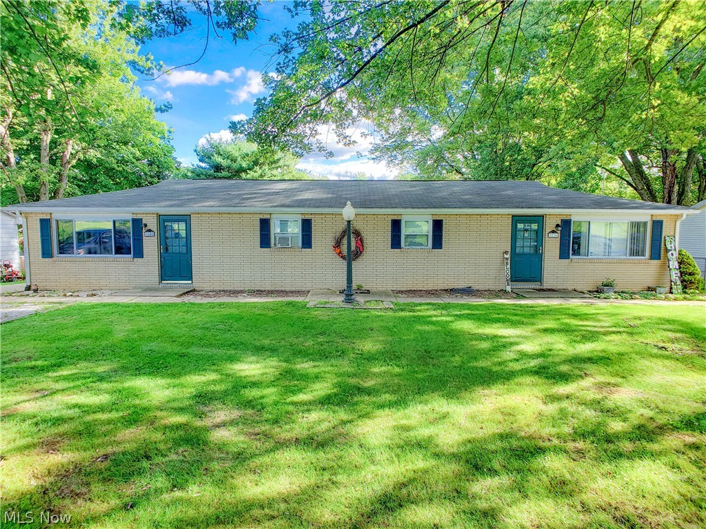 Don't let a great investment opportunity pass you by check out this well kept brick ranch duplex on a one acre lot country living atmosphere with all the city living amenities within in 10 minutes. Great for a owner occupied or just sit back and collect the already established rental income. Property features a large deck and fenced in area on one side and a smaller deck on the other. 3240 has a heat pump and owner will install central air in 3238 with a full price offer. Both units have newer hot water tanks. Property has a large 2 stall garage which could provide additional income, currently used by owner for personal storage. Has a large private back yard. Located in Middlebranch area Plain local school district.