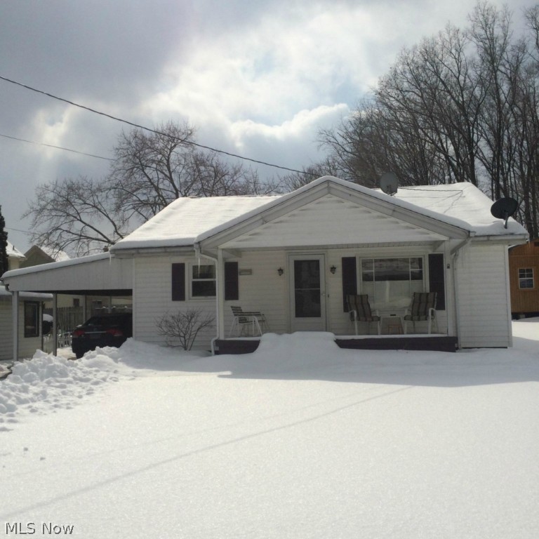 Charming 3 bedroom 1 bath ranch with lots of updates including newer windows with bay window in bonus room.  Fenced yard, private patio & front porch.  Beautiful hardwood floors. Partially finished basement.