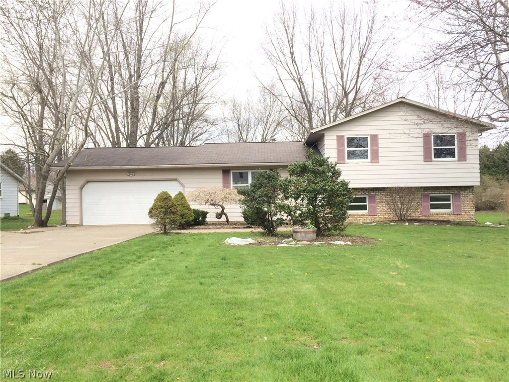 Home has a lot to offer. Nice 4 Bdrm. 2 full Baths, 4 level split.  New Carpet and new dishwasher. Large Deck off dinning area.  Storage Building.  Two car attached garage with new Door and opener.