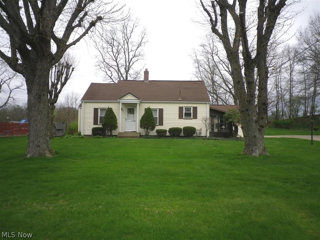 Great location backing up to baseball fields for this tidy and well maintained 2 bedroom ranch, with a 3rd bedroom possibility, at 4535 Lindford Ave NE Canton, Ohio. Enjoy the enclosed porch with jalousie windows. 2 car detached garage provides extra space for a workshop or storage.
Many updated include windows, siding, electric panel. roof, well pump. Furnace is not the original.