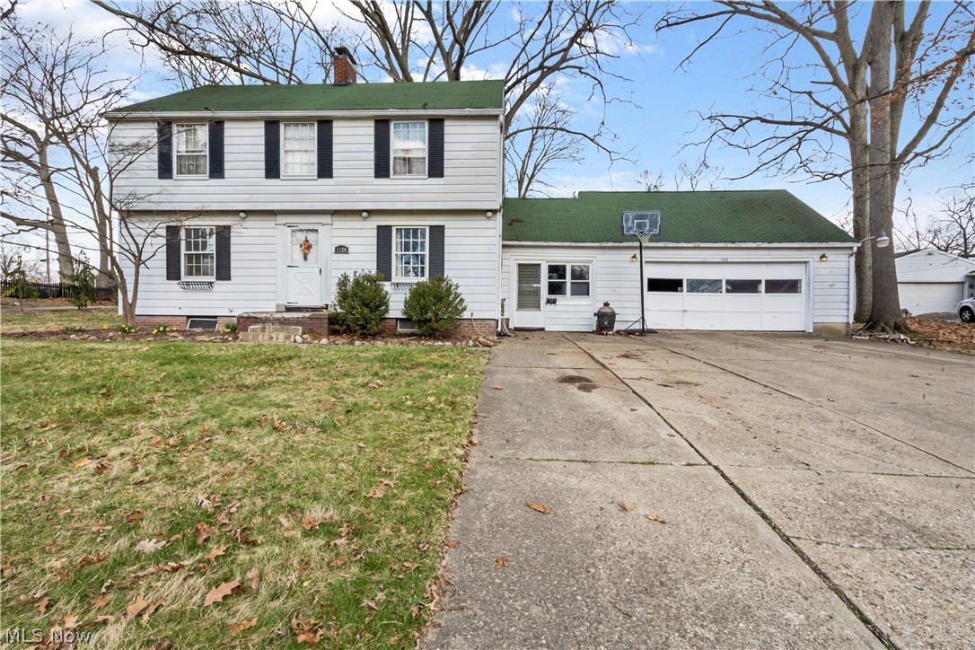 Old world charm abounds in this traditional two story home.  The floors are true hardwood and there is a half bath on the mail floor.  Entertainment sized living room, formal dining room and two of the three bedrooms could be a master.  Ultra custom built kitchen was gutted down to the studs & now boasts raised panel cabinets, built in drain in countertop, and an abundance of cabinets.  The attached garage is connected by the spacious breezeway.  Needs some tender loving care but is situated on a nice sized lot.  Mechanics are older but all are working & priced accordingly.