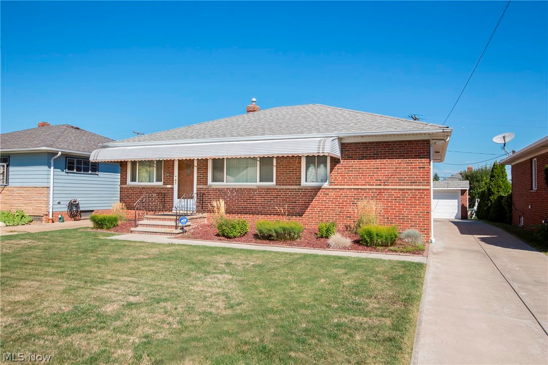 You will be amazed by this impeccably maintained all brick ranch, with every update already done for you in a charming neighborhood of well maintained homes! Two bedrooms upstairs, and one on the lower level with two full bathrooms. Ceiling fans in every room, and a wonderful enclosed patio off of the back!  The yard is fully fenced, and behind the garage is a rain barrel to help you save on water bills!  Roof was a complete tear off in 2003, and was re-inspected this year. In 2001 Stanek vinyl windows, garage door and opener were all replaced. Electrical box and wiring done in 1999 in home, and garage was re-wired in 2014. The driveway is recent and the furnace (95% efficient) with electric air cleaner, humidifier, and central air conditioner all new in 2011! Home was re-insulated in 2005 and flooring added to end to end in order to provide abundant storage.
The lower level has a roomy family room, full bathroom, and the third bedroom with a glass block egress window.
With all new c
