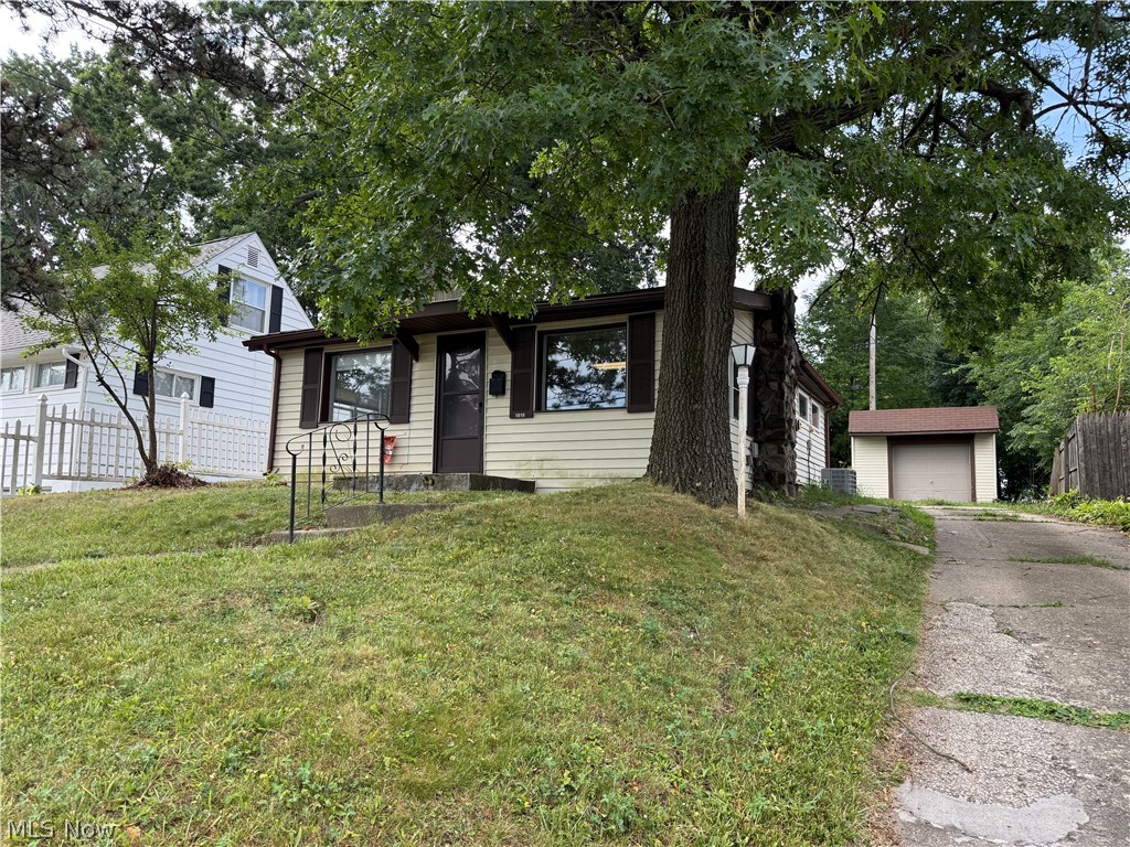 Charming and spacious 1–2 bedroom home ideally located just steps from the vibrant Portage Crossings District! Inside, you’ll find a bright, welcoming layout highlighted by beautiful granite countertops that add style and functionality to the kitchen. Step outside to enjoy the generously sized backyard—perfect for entertaining, gardening, or simply relaxing. A detached garage provides added convenience and storage. Don’t miss this opportunity to own a well-maintained home in a desirable location close to shopping, dining, and entertainment!