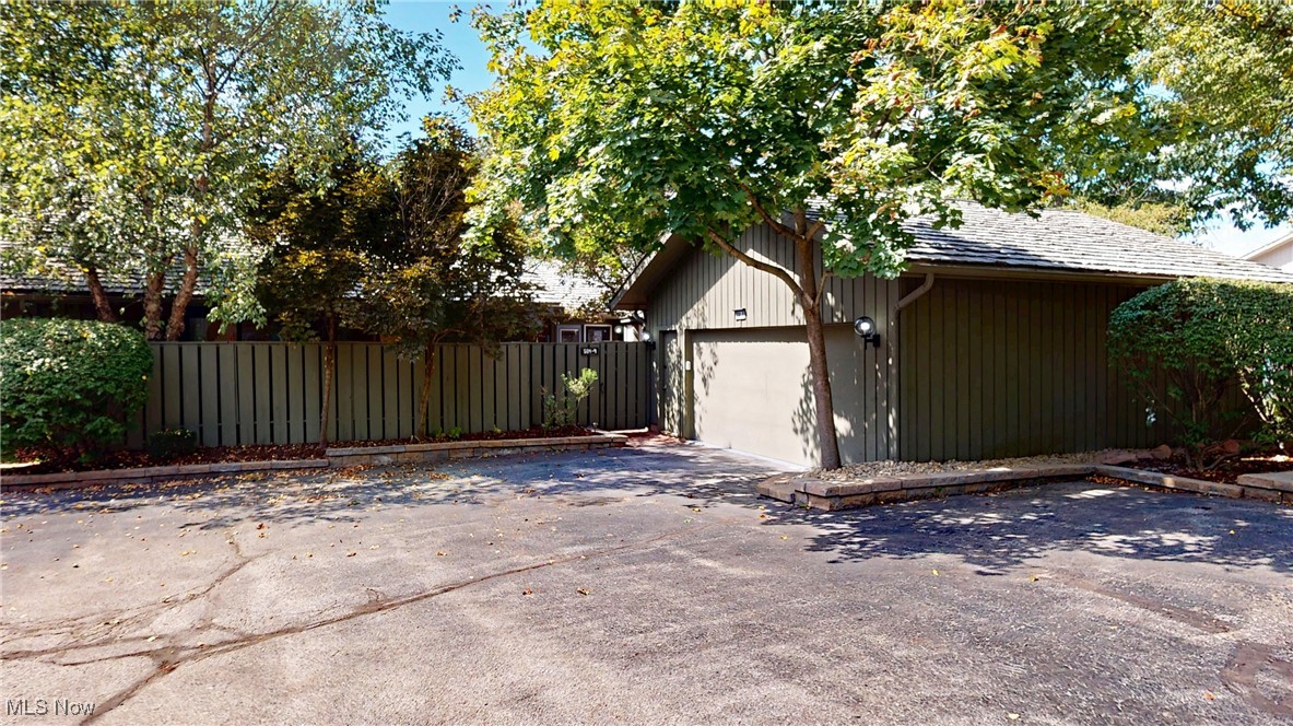 Welcome to low-maintenance living in the Walden Golf Course Community—now offered at $599,999, presenting a compelling opportunity to own over 3,800 sq ft in one of the area’s most desirable settings. Step inside and you immediately feel the difference. Natural light fills the vaulted great room, anchored by a striking floor-to-ceiling brick fireplace and framed by private wooded views, creating a space that feels both open and grounded. The main level has been thoughtfully updated with flooring, lighting, and baths, offering comfort while maintaining character. The layout flows effortlessly into an open dining area and a chef’s kitchen designed for gathering, complete with a Viking range, warming drawer, granite countertops, custom cabinetry, stainless steel appliances, a prep sink, oversized pantry, and a large island with breakfast bar. The primary suite provides a quiet retreat with its own electric fireplace, updated bath, and generous closet space, while two additional bedrooms complete the main level.
Downstairs, the finished walkout lower level expands your options with a spacious entertainment area, gas fireplace, and two sliders leading to a covered patio with electric roll-down screens. A fourth bedroom with en-suite bath and walk-in closet, along with private patio access, offers ideal flexibility for guests or multi-generational living. A dedicated exercise room—with built-in cabinetry, sink, juice/water fridge, and Pilates barre—adds even more versatility. What truly sets this home apart is the confidence it offers: pre-inspected, all repairs completed, and the full assessment paid by the seller at closing—removing uncertainty and allowing you to focus on making it your own. With a heated two-car attached garage, additional side parking, and guest parking directly across from the driveway, every detail supports both everyday living and effortless entertaining.