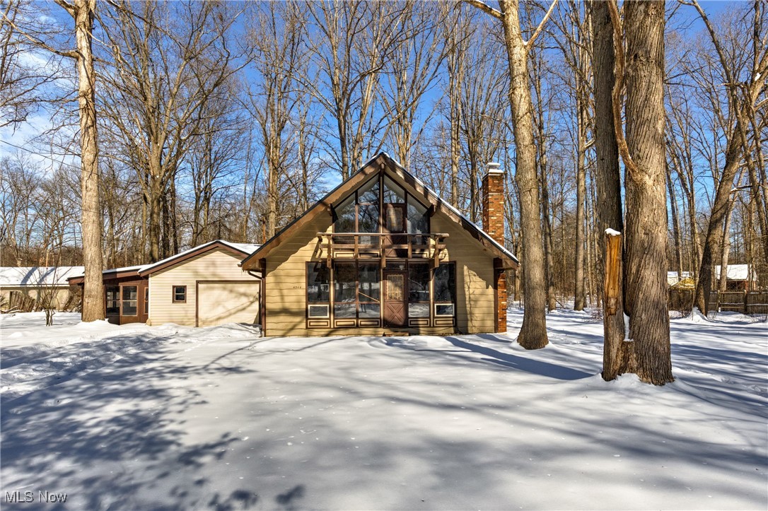 Come and check out this unique home on a quiet street in Farmington. The spacious kitchen has all new Stainless Steel appliances. The open living room has a beautiful brick fireplace and nice big windows to allow natural light inside the home. That bathroom and laundry room are on the main floor for convenience. There's also a bedroom on the mainfloor for anyone who doesn't do well with stairs. Two bedrooms upstairs, one with a gorgeous window view and personal balcony. The attached garage in perfect for keeping your vehicle out of the elements and is spacious enough for a work space area. With the second lot this property is just shy of 1 acre. Come and make this home yours today!