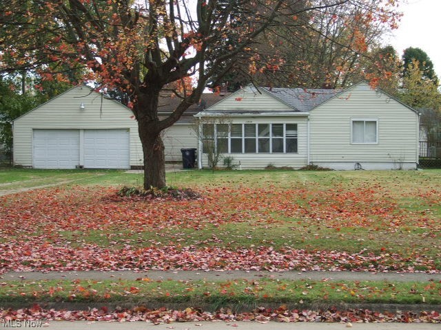 Cute 2-bedroom Ranch on almost 1/4 acre/2 parcels.  The enclosed front porch leads to large living room, then dining room with french doors to side deck and small fenced area.  The fully applianced kitchen with oak cabinets leads to small enclosed back porch/mud room, patio and backyard.  Two bedrooms, one with two double closets and large, full bathroom with handicap bars in shower complete the first floor.  The basement has wet bar, half bathroom, and laundry area with utility sink. Detached 2-car garage has gas heater.  Updates include roof 2008, H2O 2020. Hardwood floors in living room and dining rooms, not sure about bedrooms.  Staying are the kitchen appliances, washer/dryer, freezer and treadmill in basement, and safe in garage (Executrix assumes all work.)  A few personal touches could turn this into your own private oasis!!  (**Note, two new garage doors are on order and will be installed when received, even if after closing**)