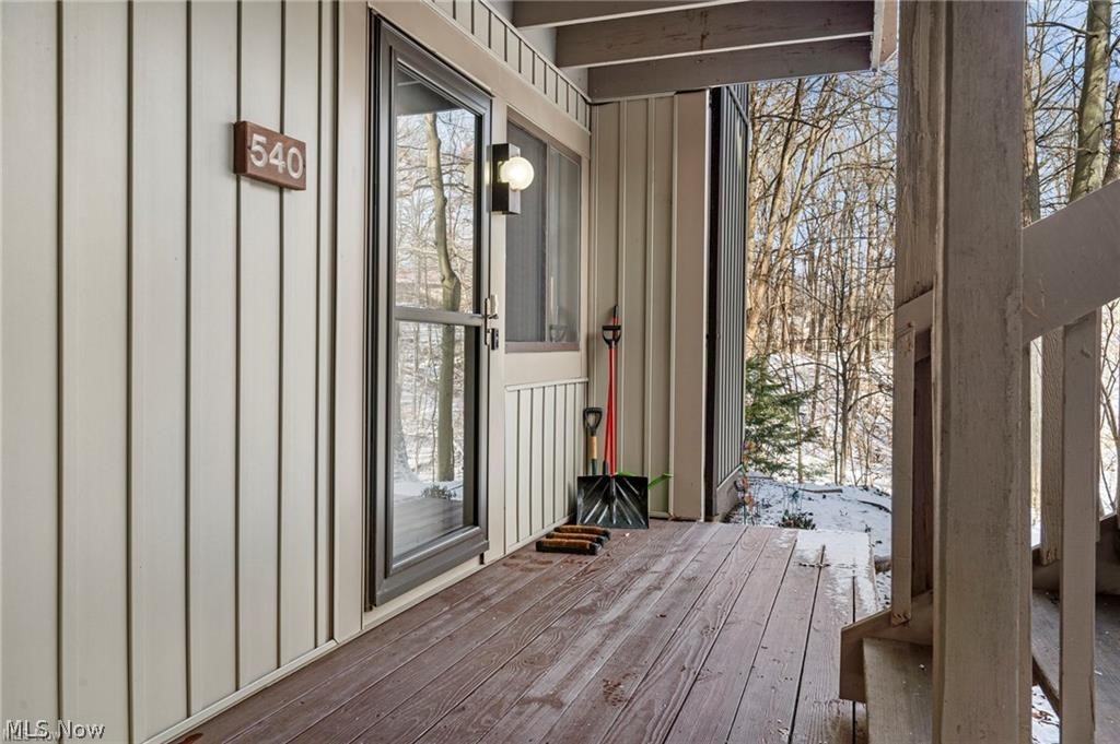 Tucked away among the trees, this rare ground-floor 2-bedroom, 2-bath condo offers the perfect retreat from the everyday. Step into the cozy sunroom, where natural light pours in and leads to a large, private deck overlooking peaceful woods and a gently flowing creek. With very few units in the community offering a ground-level deck, you’ll enjoy the feel of a backyard without the maintenance. Inside, the inviting living room is anchored by a stone-faced, wood-burning fireplace, creating a warm and welcoming space to unwind. A formal dining room sits just off the living area, ideal for hosting or everyday meals. The efficient kitchen features a convenient snack bar, generous counter space, ample cabinetry, and all appliances included. Home Warranty provide for a Peace of Mind. The spacious primary suite offers two closets and a private full bath, while a second bedroom and full bath provide flexibility for guests, a home office, or both. An assigned one-car garage adds everyday convenience, and the condo fee includes gas for heat, offering added value and peace of mind. Quiet, private, and rarely available, this home delivers comfort, nature, and low-maintenance living all in one. Once you see it, you’ll understand why opportunities like this don’t last long.