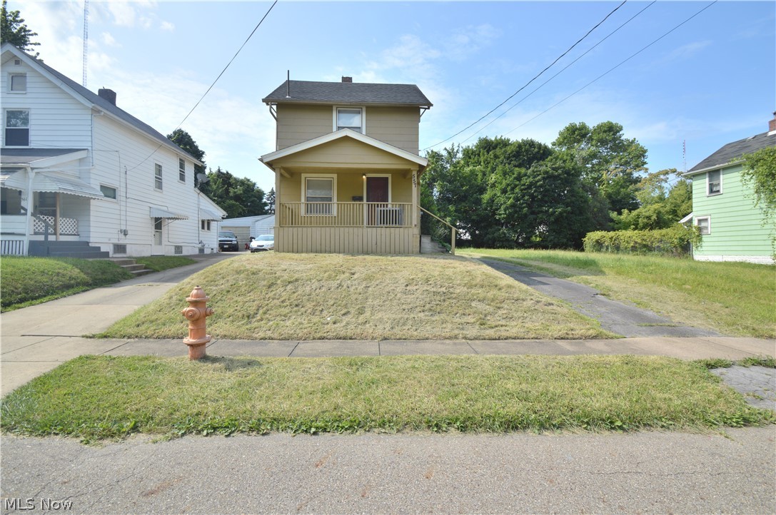 Charming two-story, two bed, one bath house in a quiet neighborhood. Just minutes away from Downtown, Youngstown State University, Community College, 2 major Health Centers, a huge entertainment center with concerts, ball games etc. and the Performing Arts Center. Close to the 680 freeway and 2 local parks. Includes 1 car garage, large basement, paved driveway and nice yard. Great first time home or rental property on a must see quiet street. So ready for your personal touches!