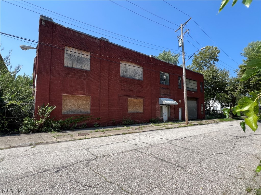 Great opportunity in the commercial Midtown area of Cleveland.  Massive building featuring over 18,000 square feet.  Incredible location north of Chester and near all downtown freeways.  Good project for business owner or visionary.  Many potential industrial, automotive, or storage uses.  Sections of the building require new roofing and substructure.  Please exercise caution when touring.
