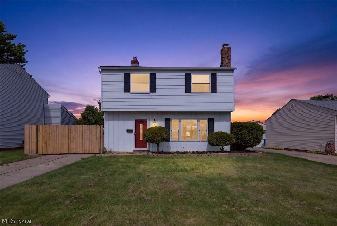 Welcome home to this four bedroom one and a half bath cute colonial offering room to roam and an amazing location within walking distance to schools & all the wonderful amenities the city holds! You'll be amazed at the kitchen size! Plenty of space for a designated coffee & snack or work station.  Very pretty granite countertops too and so much natural light that overlooks an all fenced in backyard. Current owners put a nice privacy fence up and have enjoyed it immensely! Make sure you look at the 2 1/2 car garage. Also, you'll love the four bedrooms and how much room they all have. Excellent space to have Home offices, craft rooms or a pleasant sitting room to get away from it all! A brand new roof has been put on the home as well for peace of mind to the next owner. You'll also notice the nice flooring in the living room and the amazing wood-burning fireplace with the Unique Stone decor in built-ins. It's a real charmer and waiting for you to call home sweet home. come see it today!