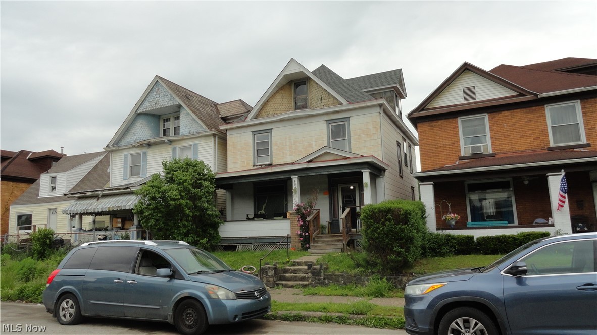 Spacious 4 bedroom house centrally located.  Large back yard, covered porches.  Third floor can be remodeled into large master bedroom, or used for additional living space.  Pocket doors and original woodwork showcase the craftsmanship of the era.