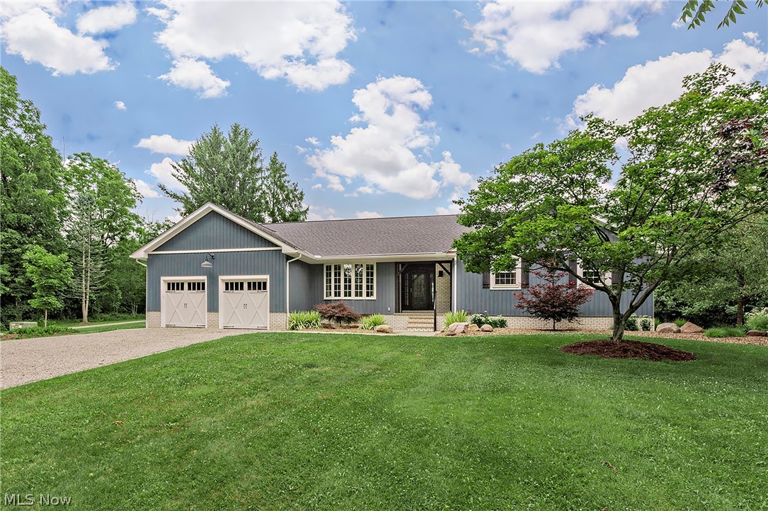 Welcome to 11292 Butternut Road, a beautifully updated 4-bedroom, 3.5-bath Chardon retreat set on over 5 scenic acres. Thoughtfully positioned in a private country setting, this exceptional property offers the perfect blend of space, comfort, and everyday convenience—complete with a picturesque pond that creates a stunning backdrop for quiet mornings, outdoor entertaining, and enjoying the beauty of every season. Inside, the home feels warm, inviting, and expertly cared for, with hardwood flooring and generous living spaces designed for both everyday living and memorable gatherings. Four spacious bedrooms and three and a half baths provide plenty of flexibility for hosting guests, working from home, or creating the spaces that best fit your lifestyle. Major updates offer added peace of mind, including a newer roof, furnace, air conditioning, heat pump, automatic whole home generator, siding, driveway, hardwood flooring, and much more (please see supplements or contact the listing agent for the full list of improvements).  Additional laundry hookup. These thoughtful updates pair beautifully with the home’s natural surroundings, giving you the charm of country living with the confidence of an exceptional maintained property. Step outside and take in all that this special setting has to offer—from peaceful moments by the pond to evenings under the stars and weekends spent enjoying the wide-open outdoor space. A generously sized barn adds incredible versatility for storage, hobbies, equipment, or future possibilities, while the two-car attached garage provides everyday convenience. Ideally located in Munson Township, this home offers a serene Geauga County setting with access to nearby parks, trails, local shops, dining, and the charm of Geauga County. A rare opportunity to own a spacious, updated home on a beautiful pond property, 11292 Butternut Road is the kind of place that feels like home the moment you arrive. Opportunities like this do not come along often!