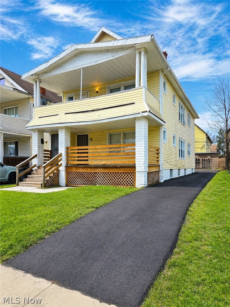 Turnkey, income producing duplex with both units occupied and generating $2,200/month in gross rent. This 2-story colonial offers a practical up/down layout with separate entrances, solid mechanicals (forced air), and a full basement (1,056 sq ft) for storage and utility access. Built in 1921 with approximately 2,112 sq ft of total living space, the property features 4 bedrooms and 2 full baths across two units. Exterior includes a covered front porch, second-floor balcony, vinyl siding, and a freshly paved driveway with off-street parking. No garage keeps maintenance simple and expenses lower. Condition is consistent with a stabilized rental—functional, not flashy. Positioned for investors seeking immediate cash flow with upside through rent optimization or cosmetic improvements. Current rents are steady; future increases are plausible depending on tenant turnover and updates. If you’re looking for granite countertops and emotional attachment, keep scrolling. If you want a property that quietly deposits money into your account every month, this is it.