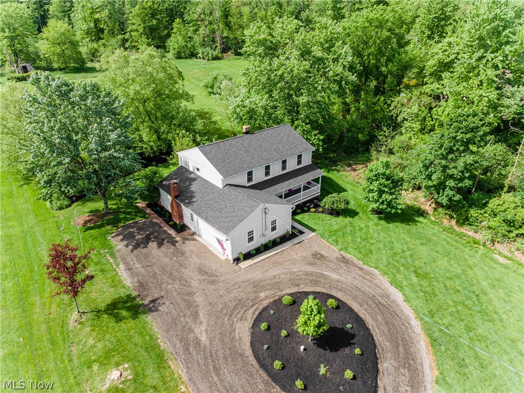 Beautifully updated 4 bedroom, 2.5 bathroom colonial situated on 3.05 picturesque acres. The first floor offers a spacious living room, formal dining area, eat-in kitchen, convenient half bathroom, first-floor laundry, and a cozy family room with a fireplace. Sliding doors from the family room lead to the stone patio, perfect for relaxing or entertaining while enjoying the scenic backyard views. The finished basement provides additional living and recreation space. Upstairs features four nicely sized bedrooms and two full bathrooms, including a spacious primary suite. A two car attached garage adds convenience and extra storage.
This well-maintained home also features all new storm blinds throughout the property, split system boiler heat with central air, and gravity-flow drainage throughout the home. The basement sump pump is currently used only as a floor drain for the water softener. Major updates include a new high-efficiency hot water heater (2024), new lifetime roof (2024), new Kinetico water softener (2024), new well and pump (2024), brand new carpet (2026), fresh paint (2026), and new flooring (2026). A wonderful blend of modern updates, comfortable living, and peaceful surroundings.