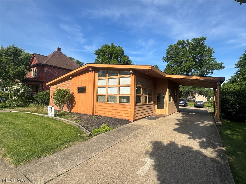 AUCTION DATE: Wednesday July 8th 2026. OPEN HOUSE: Wednesday July 1st from 5-6pm. Great opportunity to purchase a small professional office building previously used as a counseling center. The building offers a waiting and reception area, multiple office rooms, break room, utility room & 2 bathrooms. Behind the building you will find the dedicated concrete parking lot. Also, there is a green space that could possibly allow for additional parking or future expansion. Situated on approx. one-quarter acre city lot on the main thoroughfare providing excellent visibility & accessibility. This versatile property would be well suited for a variety of uses including a medical/ dental office or a multitude of other professional office space. Zoned C-1 office district. Come see what all this location has to offer! Announcements on the day of sale take precedence over all previous advertising.