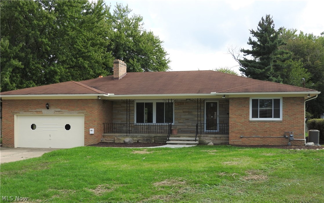 Really nice 1800 sq foot brick ranch on huge 1/2+ acre lot * Fantastic brand new granite kitchen with brand new stainless appliances including dishwasher * Brand new bathrooms * New windows and doors * hardwood floors and his/her closets in main floor bedrooms * 2 enclosed porches * finished basement has extra rooms for office or bedrooms and full bath * WBF * Public water/sewer * city just poured new sidewalks and street * spotless!