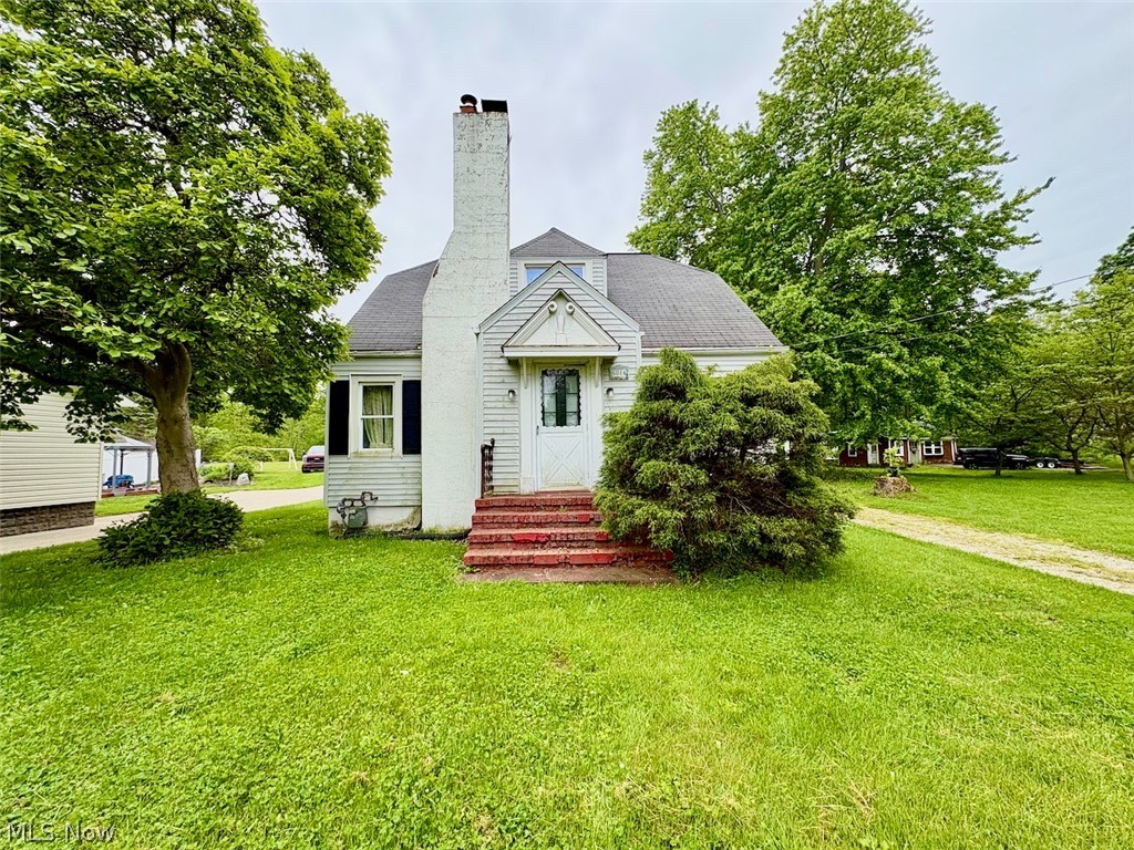 Opportunity awaits at 6014 North Ridge Rd. West in Saybrook Township! Situated on just over a half-acre lot, this 3-bedroom, 1.5-bath home offers plenty of space, charm, and potential for the right buyer willing to roll up their sleeves and bring their vision to life!
The main floor features a spacious living room with fireplace, a dining room, a primary bedroom, a full bathroom, and a laundry room. The kitchen includes an island and oak cabinetry. Hardwood floors run throughout much of the home and are ready for restoration and renewed charm.
Upstairs, you'll find two additional bedrooms and a half bath. The full walk-out basement offers excellent storage and the possibility of additional living space with renovation.
Outside, the property includes an extra-deep two-car garage with ample room for storage, as well as a storage shed towards the rear of the lot. This property is in need of repairs to bring it back to its charming former self.