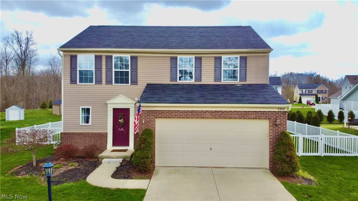 You are not going to want to miss this one! This move in ready 3 bedroom/2.5 bath features, sun filled great room with fireplace, great room opens to kitchen, which opens to vaulted sun room for additional space. Sliding doors open to spacious backyard with newly updated fence. Mud room off garage entry to neatly organize all your belongings when coming in. Half bath completes the first floor. Second floor has a spacious master with walk in closet and full bath, 2 additional bedrooms, laundry room, and second full bath. The finished basement features media/play room, utility area with plenty of storage space and workshop with workbench!