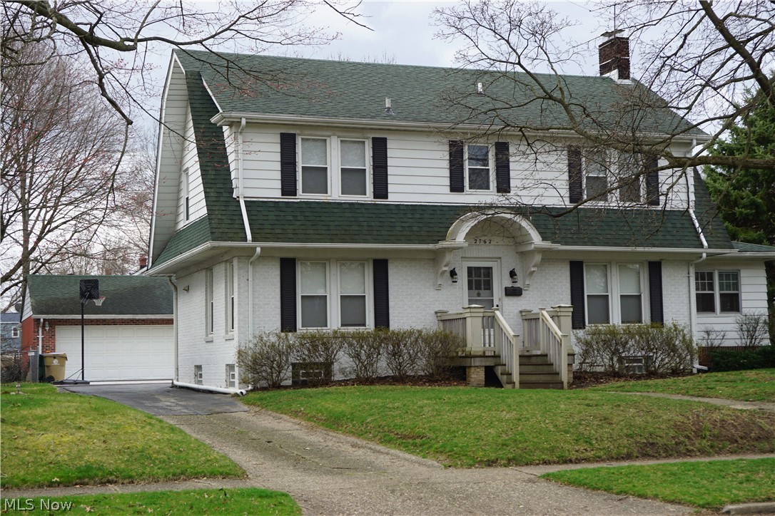 Spacious River Estates Colonial with 4 Bedrooms.  Large kitchen with oak cabinets and new laminate floor.  Formal dining room with  ceiling fan and oak floor. Living Room with fireplace has patio door to large back porch. Office with knotty pine wood walls. Main bathroom recently remodeled. All carpet replaced 2017.  Rec room in basement with door and stairway to outside. Large corner lot. Oversized 2 car garage with additional storage space and workbench. Rear circle driveway accessable from both streets and has additional concrete turnaround and parking. Home warranty included.