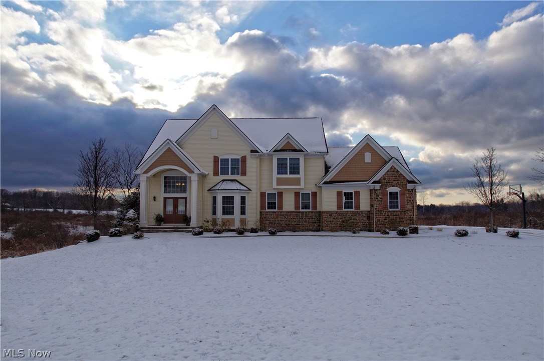 Gorgeous custom built Payne & Payne home just waiting for you in the peaceful Arborwood Subdivision. Built in 2008, the home features Brazilian Cherry hardwoods and crown molding throughout the first floor. Two story foyer. Huge gourmet kitchen w/granite counters, stainless appliances and expansive granite center island. Great room w/fireplace, full wall built-ins and wired for surround sound. Master Retreat w/tent ceiling, His & Her's walk-ins and 21' glamour bath. 3 additional bedrooms are generous in size & all feature walk-in closets. Walk-out finished lower level Media Room w/1/2 bath. Pottery Barn influences throughout this meticulous home. Just a pleasure to show!