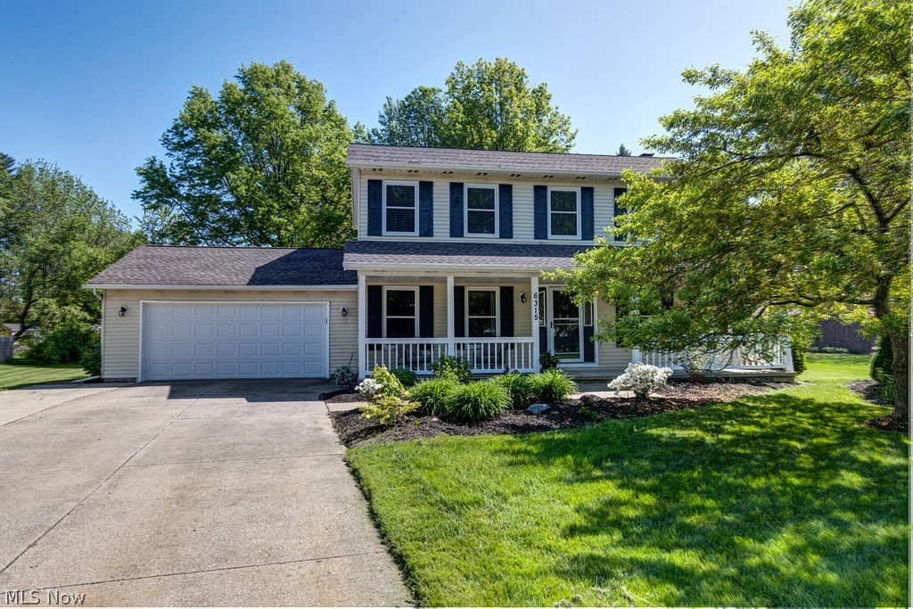 Updated Colonial On A Private Mentor Cul-De-Sac! 4 bedrooms / 2.5 baths. You will fall in love at your first view from the curb! Lovely landscaped yard with a large, welcoming front porch. The spacious eat-in kitchen has been refreshed with granite counter tops, updated cabinetry and new sink. All bathrooms have also been completely remodeled with new tub and shower surrounds, light fixtures, commodes and granite topped vanities with Moen fixtures. Engineered hardwood floors run throughout from the front entryway into the dining room and kitchen. A cozy, wood-burning brick fireplace accents the family room. Sliders give access to the large outdoor deck, just perfect for family barbeques! Separate formal living room and half bath complete the main floor. More updates include windows (2018), newer paint, carpeting (2018 and 2020) and light fixtures (2019). Upstairs are 4 sizeable bedrooms, including the master suite with private full bath. The full, unfinished basement and an attached 2-