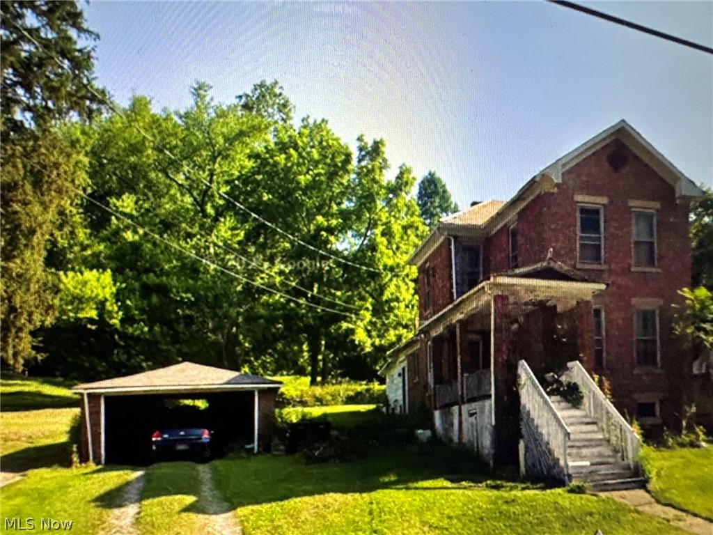 Great investment opportunity! Brick home, 2-car garage, ready for your touch. Home needs work -  and due to its current condition, the seller is looking for cash or private money loans only.  2 parcels are included, totalling .165 acres