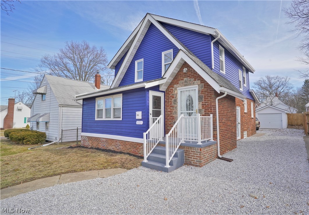 Welcome to this charming, updated (all done 2021) three-bedroom, one full bath home! Come on into the living room or enclosed porch. WOW! The bright living room has built in shelves with brick wood fireplace, all open to the large dining room and kitchen. The bright, updated kitchen offers abundant of white cabinets, backsplash, pull-down sprayer, double size single sink, stove, built in microwave and refrigerator. Upstairs you will find three updated bedrooms with new carpet, freshly painted and a full remodeled bathroom. The basement is very clean with plenty of room for work out equipment, storage, etc. The backyard has a large deck where you can sit out and enjoy, grill etc. There is a one car detached garage. Nothing to do but move in!