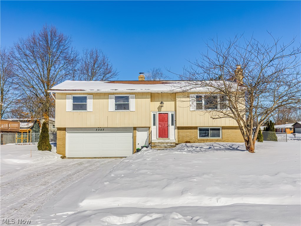 Welcome home to this beautifully updated split-level offering comfort, style, and functionality! From the moment you arrive, you’ll appreciate the inviting curb appeal, mature tree, and charming red front door that makes a statement. Step inside to a bright and welcoming living room filled with natural light from the large picture window, highlighting the warm hardwood updated floors and neutral décor. Make your way into the dining room and the updated kitchen, which is sure to impress with white cabinetry, granite countertops, subway tile backsplash, stainless steel appliances, and plenty of cabinet space—perfect for everyday living and entertaining. This home offers a practical layout with spacious bedrooms, generous storage. If that's not enough, head down to the lower-level family room for all your recreational needs and those cold nights to stay warm. Plus, go enjoy the sunroom where you can relax with your coffee or read a book. The attached garage provides convenience, while the yard offers room to relax, play, or entertain. Move-in ready with tasteful updates throughout—this is one you won’t want to miss!

**contingent on seller finding and closing on home of choice.