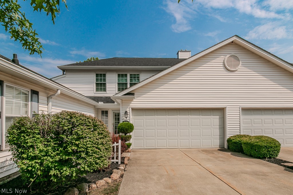 Vaulted ceilings and dramatic two-story windows set the tone for this bright Marsh Landing townhome, offering nearly 1,900 square feet of thoughtfully designed living space that blends style, comfort, and low-maintenance living. Step inside to a welcoming foyer that leads into a bright eat-in kitchen featuring granite countertops, abundant cabinetry, and generous prep space—perfect for both everyday living and entertaining. The open layout flows seamlessly into the dining and living areas where the soaring ceilings and expansive windows fill the home with natural light. Upstairs, a versatile loft overlooking the living space creates the perfect flex area for a home office, reading nook, additional 3rd bedroom or creative hobby space. The spacious primary suite offers a peaceful retreat with an updated en-suite bath, soaking tub, tiled shower, and modern vanity. Additional highlights include main-level laundry, an attached two-car garage with storage pull down access, and a private patio overlooking the most desirable neighborhood greenspace. This patio is ideally suited for morning coffee or evening relaxation. Nestled on a quiet cul-de-sac in the desirable Marsh Landing community, this home offers the perfect balance of space, comfort, and maintenance-free living with convenient access to shopping, dining, and commuter routes. Only a couple minutes away from Lake Erie too! If you’ve been waiting for the right opportunity in Marsh Landing, this is one you won’t want to miss. Call for a private showing today!