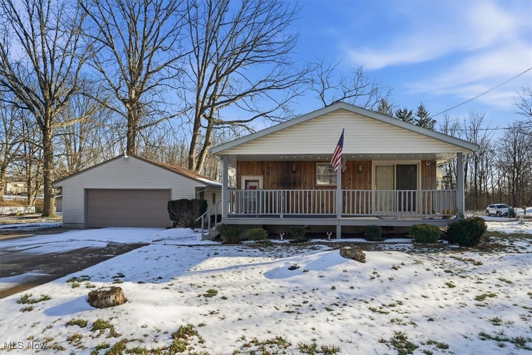 Welcome home to this well-maintained 3-bedroom ranch offering first floor living and a functional, versatile layout. The kitchen is clean and bright and offers wonderful countertop space and cabinetry for storage. The main level also features 3 large bedrooms with hardwood floors, closets and a beautiful full bathroom. A partially finished basement provides extra living space—ideal for a rec room, home office, 4th bedroom or workout area, while an additional full bath on the lower level adds convenience and flexibility. Enjoy the benefits of a spacious 2-car garage and an extra-large yard perfect for entertaining, gardening, or play. You will absolutely love the covered front porch, perfect for those warm summer evenings and a good book. A great opportunity with room to make it your own. Don't miss this opportunity for a beautiful turnkey home, book your private tour today!