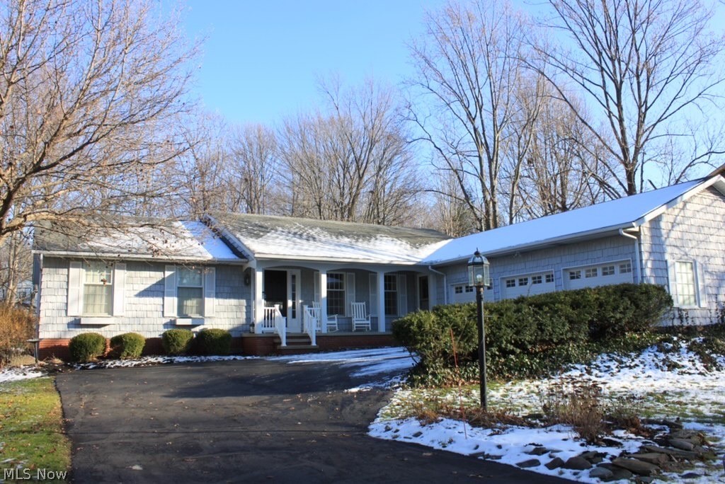 Classic & traditional describe this 6 BR, 3.5 Bath Ranch home located in desirable Concord Twp., You will be PLEASANTLY surprised at the amount of SQ. FT. this home has to offer! Invited in by the CHARMING curb appeal, step onto the front porch & enter the foyer w/ formal LR & dining room. The kitchen has white cabinetry, center island, newer appliances & butler pantry. Open to the kitchen is the family room featuring built-in book cases & WBFP. Rustic Hickory vinyl flooring accent the first floor  with tons of natural light. First floor master with expansive closet space, freshly redone en suite with tiled shower, tub & vanity. Two Secondary BR's, w/ option of in-law suite, full bath, EXPANSIVE laundry room w/ built in desk/work area, shoe cabinet, half bath & access to 3 car attached heated garage complete the upstairs!  Downstairs you will find 2 AMAZING family rooms, additional WBFP, 3 bedrooms with full egress, full bath, 2nd kitchen in basement with appliances, craft/hobby room,