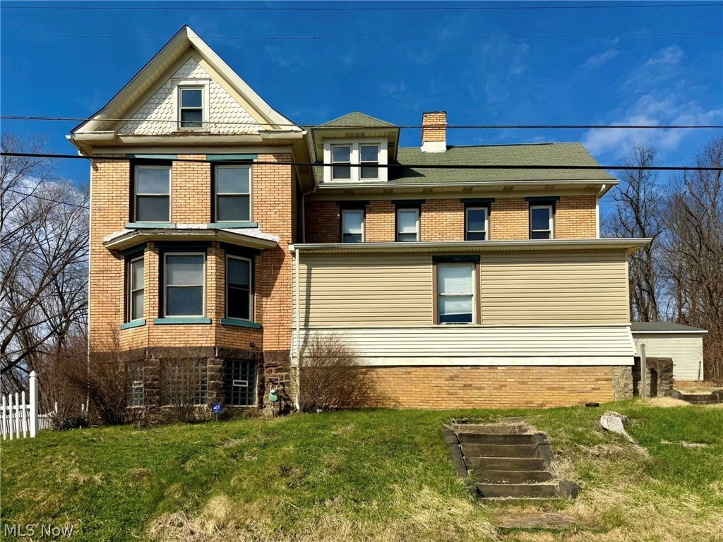 Charming brick two-story home located in the East Liverpool School District, offering 4–6 bedrooms and 2 full bathrooms. With over 3,000 square feet of living space, there’s plenty of room to spread out while still enjoying the character and charm this home has to offer.

Situated on approximately 1.5 acres, plus an additional lot, this property gives you a peaceful setting with scenic views and plenty of outdoor space to relax or entertain. The oversized 32x36 detached garage is perfect for extra storage, a workshop, or additional parking.

Inside, you’ll find two kitchens, making this home ideal for multi-generational living or anyone looking for added flexibility. Whether you need space, versatility, or just a quiet place to call home, this property offers so many possibilities.