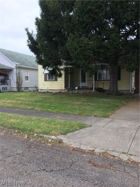 Adorable and well maintained 3 bedroom capecod. Newer windows, air and furnace. Large two car garage, cement driveway, Hardwood floors underneath carpet. Quaint and cute with lots of potential!