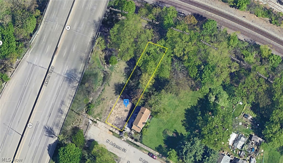 Explore this 4,983 sq. ft. gently sloped lot in Akron, Summit County, Ohio, featuring partially wooded terrain and no HOA. Located in a quiet residential neighborhood with a mix of homes, the lot offers a peaceful suburban feel while being just minutes from major highways, schools, shopping, and parks. With ready-to-build potential, this property is an ideal spot for a custom home in a convenient and well-connected neighborhood.