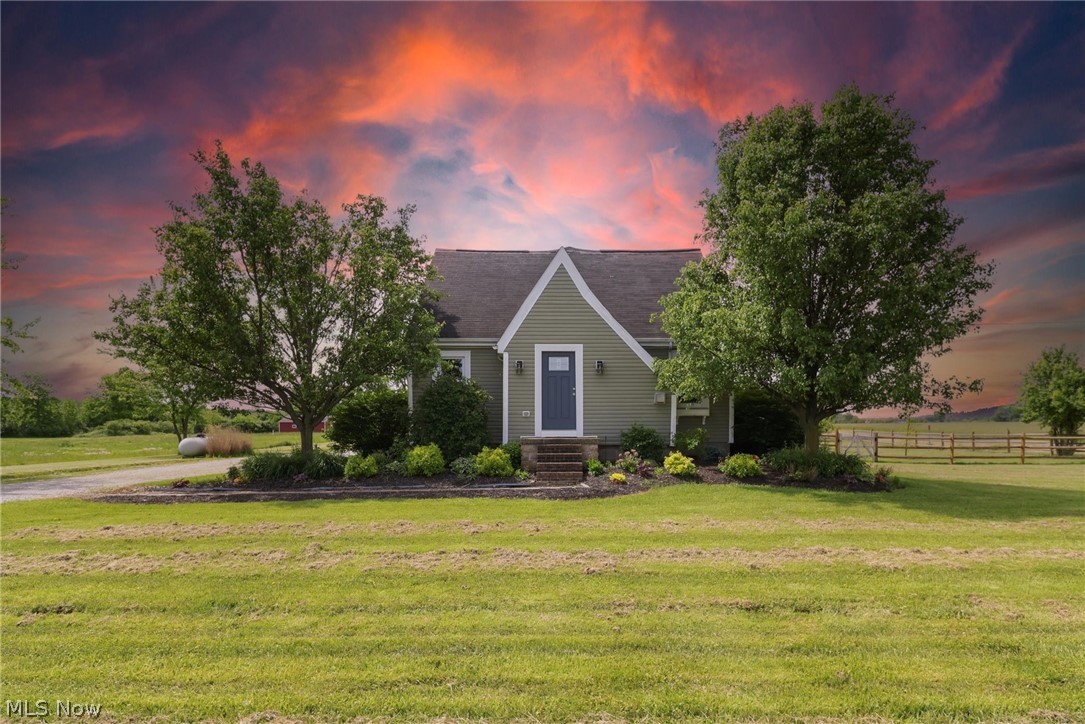 Welcome to country living at its finest! Situated on 3.64 scenic acres, this beautifully updated farmhouse in Oberlin offers 4 bedrooms, 3 full baths, and over 2,600 sq ft of living space. Inside, you’ll find spacious living areas filled with natural light, hardwood floors, and modern updates throughout. The stunning kitchen features live-edge maple countertops, natural woodwork, a breakfast bar, and ample storage.

Enjoy peaceful outdoor living with a brand-new composite deck overlooking the property. The oversized 2-car garage with 8-foot doors provides plenty of room for larger vehicles and storage. An impressive 2,400 sq ft pole barn with electric, water, office space, and loft offers endless possibilities for a workshop, hobbies, business use, or additional storage.

Additional highlights include a newly installed septic system, updated flooring, and plenty of parking space. This one-of-a-kind property combines timeless farmhouse charm with modern comfort and functionality while offering the privacy and tranquility of country living just minutes from town amenities. Don’t miss this incredible opportunity!