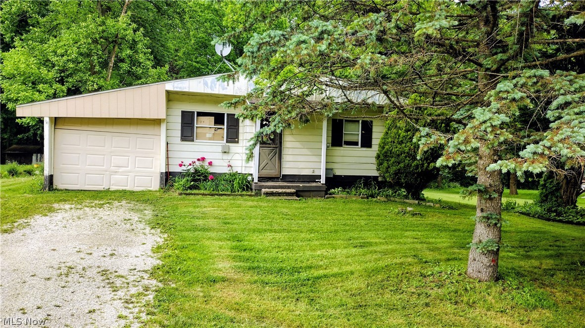 Unlock the potential of this ranch-style fixer upper on a spacious over half-acre lot! Tucked away on a quiet dead-end street, this home offers a peaceful setting with room to grow. The property features an attached one-car garage plus additional rear space ready to be converted into added living square footage, office space, or a bonus room. Whether you're an investor or a homeowner looking for a project, this property is full of opportunity and potential