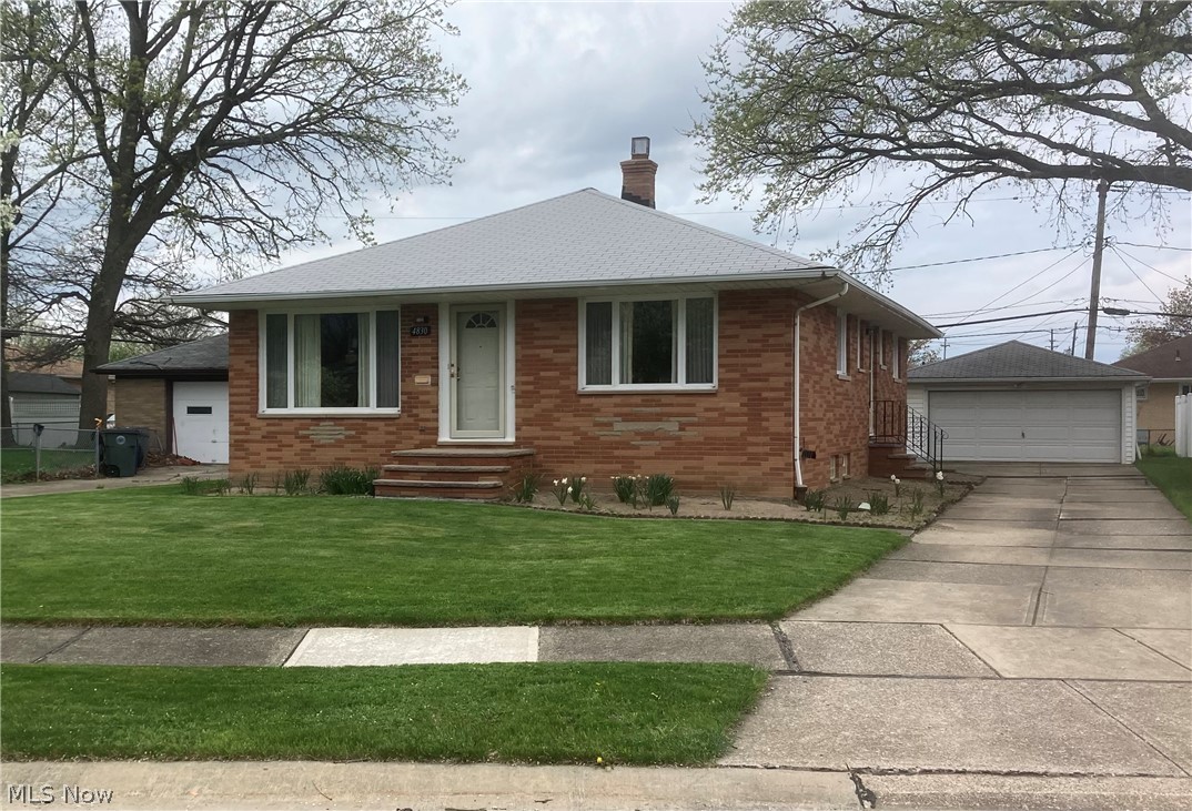 Welcome to this immaculate brick ranch located on a quiet cul-de-sac street. This 3 bedroom, 1.5 bath ranch home offers tons of natural light and gorgeous original hardwood floors, spacious kitchen with tons of cabinets and counter space.   All kitchen appliances stay. The living room and dining rooms are carpeted and have large bay windows. The large partially finished basement includes and entertainment area, laundry and storage areas with glass block windows.  Large two car garage with private back yard. Updates include waterproofing 2019, roof 2021, electrical panel 2024, masonry work 2025, plumbing 2025 and painting throughout the home. Located  near schools, parks, shopping and highways.