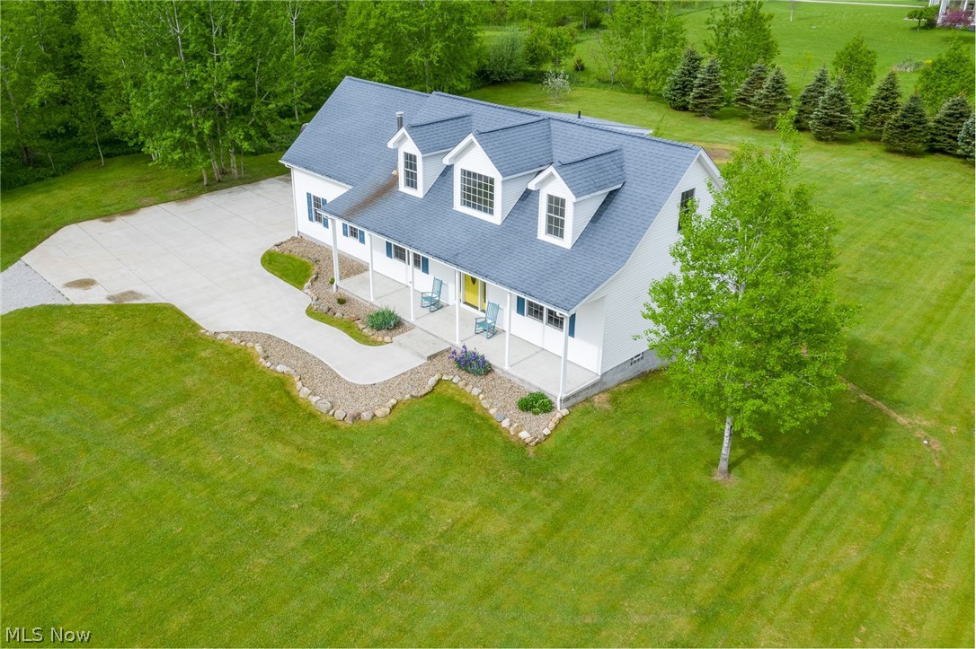 You're not going to want to miss this one! What an amazing opportunity to own a gorgeous, updated cape cod style home in Newbury!  Sitting on over 3 acres of land, this home boasts comfort and charm throughout!  Enter the front door, to find an oversized living area, with a coal burning fireplace.  Kitchen has been fully remodeled, and all new luxury vinyl throughout the entire first floor.  Kitchen has lots of countertop space as well as plenty of cabinets for storage. Appliances are all newer stainless steel.  First floor master right off eat in kitchen, with sliding glass door to backyard.  Off eat in kitchen is also a 1/2 bath for guests.  Master has large amount of closet space, updated bath, and customized laundry shoot.  Head upstairs to another large open area that can be used for a family room or study.  2 additional bedrooms and a full bath complete the upstairs.  The lower level has a walk out basement, water filtration system is paid for and all stays with the home.  Oversi