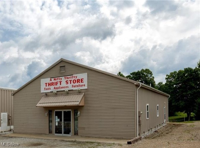 Prime Commercial Building for Lease – Introductory Offer \$1,500/Month (Triple Net). Take advantage of this rare leasing opportunity in a highly visible, well-traveled location near town. This 2,600 sq. ft. commercial building has been home to a very successful resale business for many years. It is now available as the owner has relocated to pursue a new business venture outside the area. The space includes approximately 720 sq. ft. of well-finished office area featuring a full bath, making it ideal for flexible business operations. The balance of the space provides ample room for retail, showroom, or other commercial uses.Lease Terms: $1,500/month (NNN) for Year. Rent increases to $1,700/month in Year 2 and 3. 

This building’s proven track record for success, combined with its prime location and functional layout, make it a fantastic choice for your next business venture!