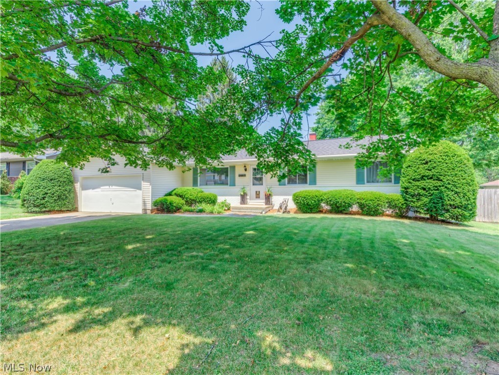 Move-in ready 3 bedroom, 1.5 bath Ranch. Formal living room with hardwood floor, spacious kitchen opens to the dinette with new cabinets, countertops, stainless steel appliances, and flooring, doors, and hardware 2018.  Family Room with slider to the back yard.  The Master bedroom offers 1/2 bath, 2 additional bedrooms with hardwood floors. Other recent improvements include H20 tank 2014, updated electric 200 amp box 2013, A/C 2012, Roof 2008, windows and furnace 2005. 2 car attached garage, full basement with updated plumbing. Glass block windows. City water.